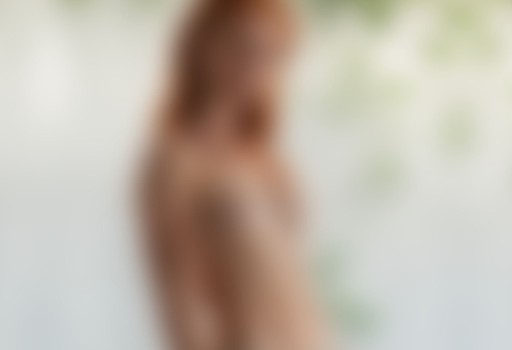 A young woman with an olive complexion, seemingly